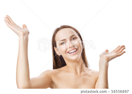 Happy smiling girl raised her hands with palms up Happy smiling girl raised her hands with palms up 58556897