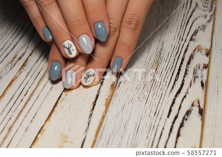 glamorous beautiful manicure on a trendy texture 58557271