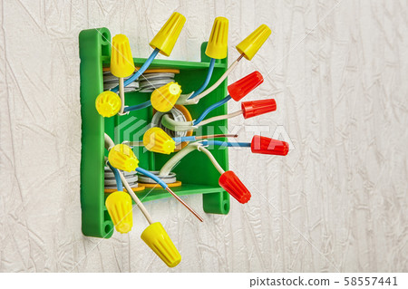 Twist-nut connection of electrical wires in wiring 58557441