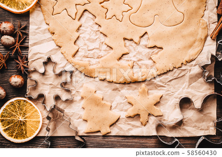 Gingerbread dough for Christmas cookies Gingerbread dough for Christmas cookies 58560430