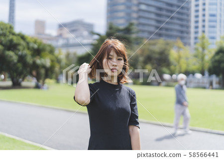 A woman in the park 58566441