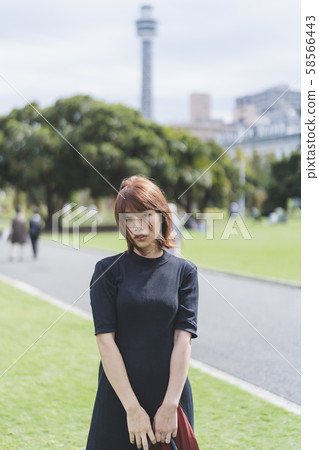 A woman in the park 58566443