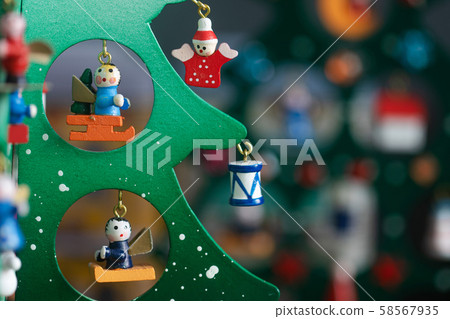 Christmas tree wooden toy decoration on gray Christmas tree wooden toy decoration on gray 58567935