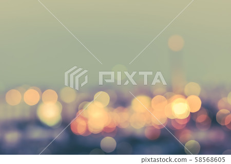 Vintage style blur city background rooftop view of cityscape business building landscape night lights bokeh Vintage style blur city background rooftop view of cityscape business building landscape night lights bokeh 58568605