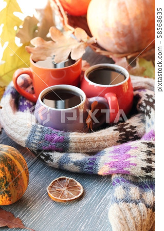 Three cups of coffee, pumpkins, leaves Three cups of coffee, pumpkins, leaves 58568635
