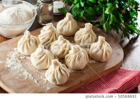 Raw Georgian dumplings - Khinkali (Chinkali) with Raw Georgian dumplings - Khinkali (Chinkali) with 58568691