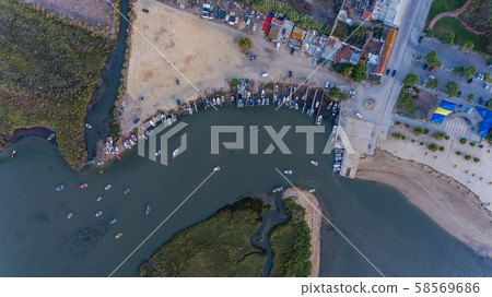 Aerial. Bay near the Vasco da Gama Lisbon Bridge, Samuoco. 58569686
