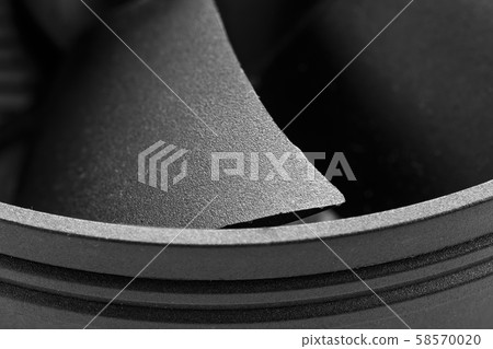 Blades of a computer fan close-up on a gray 58570020