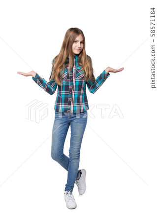 Teen girl in checkered shirt shrugging her shoulders Teen girl in checkered shirt shrugging her shoulders 58571184