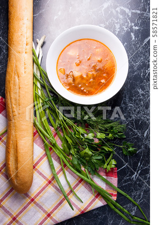 Vegetables and meat in red beetroot soup or borsch Vegetables and meat in red beetroot soup or borsch 58571821