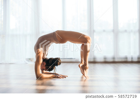 Woman make yoga. Woman make yoga. 58572719