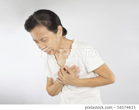 old asian woman feel chest pain around the heart because cardiology symptoms old asian woman feel chest pain around the heart because cardiology symptoms 58574615