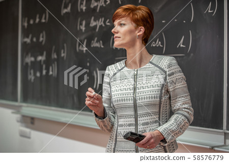 Young teacher to lecture at universities. Teaching mathematics 58576779