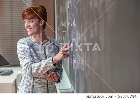 Young teacher to lecture at universities. Teaching mathematics 58576784