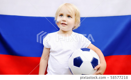 Portrait of cute little boy with russian flag  58577218
