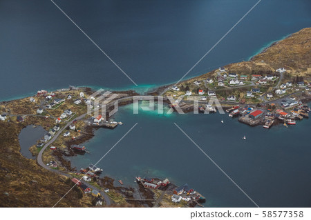 Scenic landscape of Lofoten islands: peaks, lakes, and houses. Reine village, rorbu, reinbringen 58577358