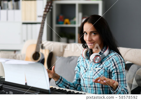 Pianist in musical studio Pianist in musical studio 58578592