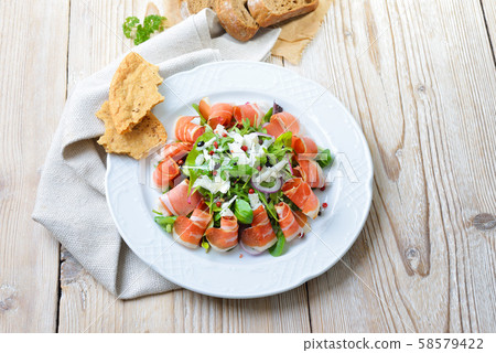 Salad plate with South Tyrolean bacon, served with parmesan cheese and rye bread 58579422