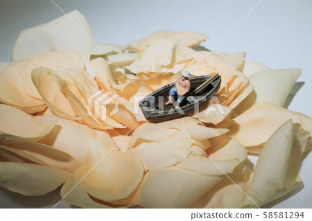 a mini figure is fishing on the flower a mini figure is fishing on the flower 58581294