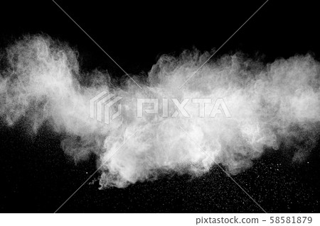 abstract white powder splatter on black background,Freeze motion of white powder exploding. 58581879