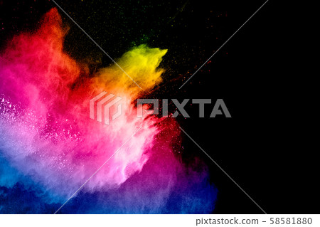 Colorful powder explosion on black background. Abstract pastel color dust particles splash. 58581880