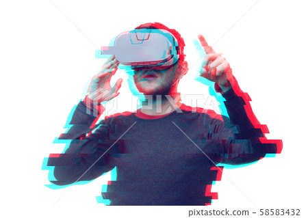 Man is using virtual reality headset on white isolated background. Glitch effect image. Man is using virtual reality headset on white isolated background. Glitch effect image. 58583432