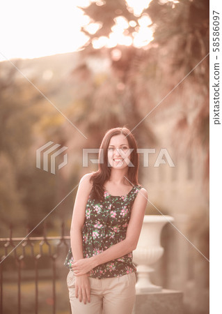 Young woman tourist posing on photo portrait 58586097