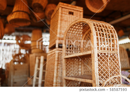 Handmade wicker furniture, products and souvenirs at the street craft market. 58587593