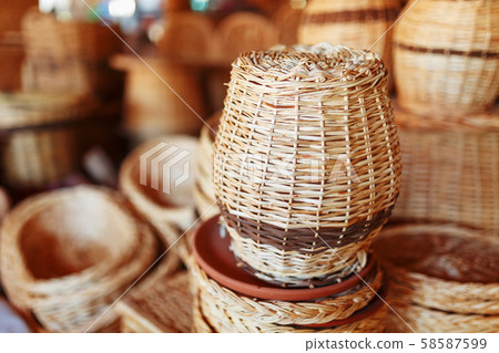 Handmade wicker baskets, items and souvenirs at the street craft market 58587599