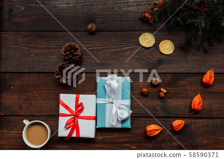 Christmas background with gifts and Christmas tree tea cup fruit 58590371