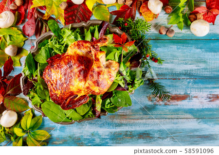 Thanksgiving table served with dinner roasted Thanksgiving table served with dinner roasted 58591096