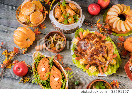 Roasted turkey garnished with many dishes on the Roasted turkey garnished with many dishes on the 58591107