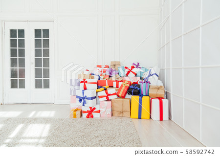 Lots of multi-colored gifts for the surprise holiday 58592742