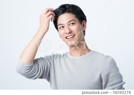 Male in twenties Male in twenties 58593278