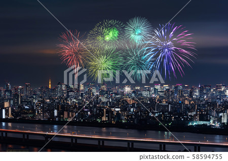 Fireworks over Tokyo cityscape at night, Japan Fireworks over Tokyo cityscape at night, Japan 58594755