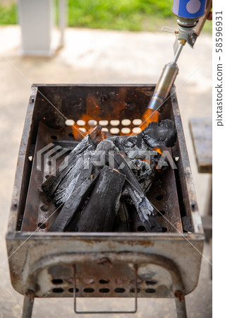 BBQ fire burning gas burner 58596931