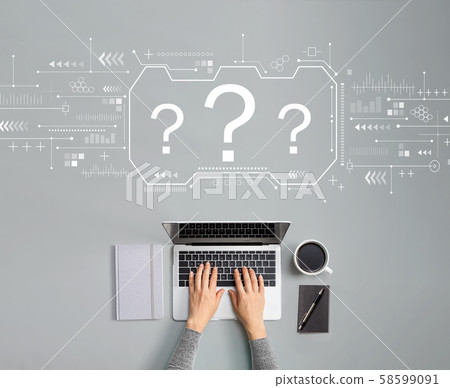Question marks with person using laptop Question marks with person using laptop 58599091