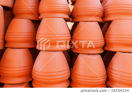 Handmade ceramic crockery made of clay of brown Handmade ceramic crockery made of clay of brown 58599234