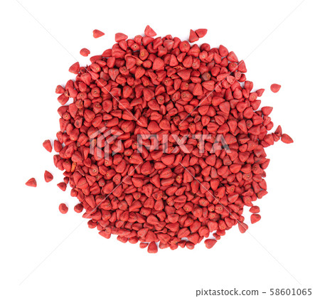 Annatto seeds, isolated on a white background. Achiote seeds, bixa orellana. Natural dye for cooking 58601065