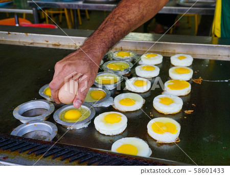Fried eggs at local restaurant Fried eggs at local restaurant 58601433