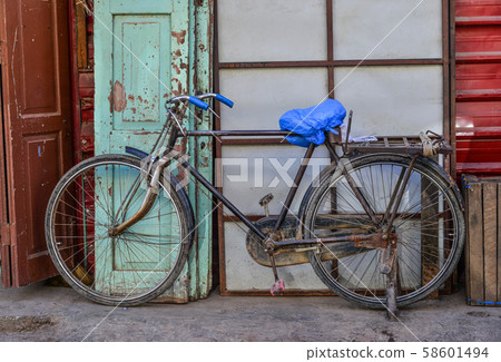 Old bicycle on street 58601494
