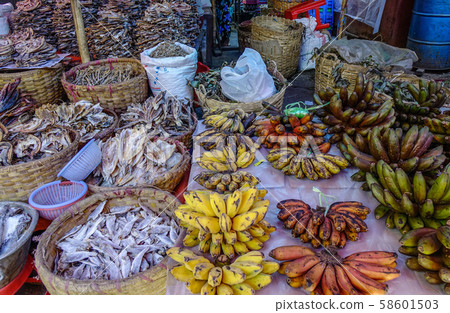 Selling banana with dry fish Selling banana with dry fish 58601503
