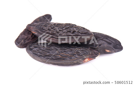 Tonka beans isolated on white background. Bean of Dipteryx odorata, cumaru or kumaru. Fresh aroma 58601512