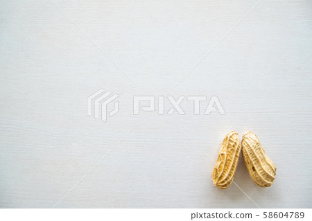 Top view of Two monkey nut or peanut are on the white back ground 58604789