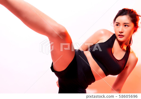 Female athlete martial art 58605696
