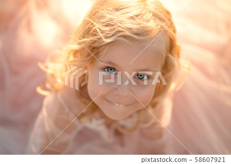 Portrait of a beautiful little princess girl in a Portrait of a beautiful little princess girl in a 58607921