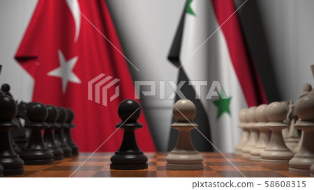 Flags of Turkey and Syria behind pawns on the chessboard. Chess game or political rivalry related 3D Flags of Turkey and Syria behind pawns on the chessboard. Chess game or political rivalry related 3D 58608315