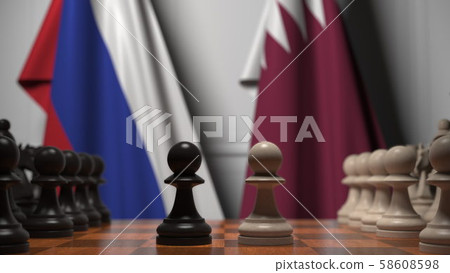 Flags of Russia and Qatar behind pawns on the chessboard. Chess game or political rivalry related 3D Flags of Russia and Qatar behind pawns on the chessboard. Chess game or political rivalry related 3D 58608598