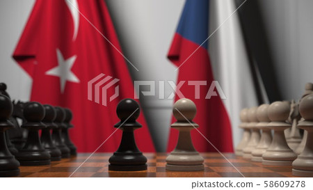 Flags of Turkey and the Czech Republic behind pawns on the chessboard. Chess game or political 58609278