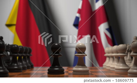 Chess game against flags of Germany and Great Britain. 3D rendering Chess game against flags of Germany and Great Britain. 3D rendering 58609775
